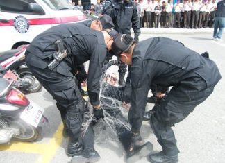 Police recruits learned suppression techniques during a training session in Pattaya.