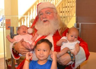 Santa has time for some younger members of the PCEC audience.