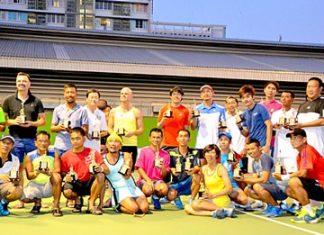 Category winners pose with their trophies at the conclusion of the Bangkok Pride International Gay Lawn Tennis tournament on December 7 at Chulalongkorn University in Bangkok.