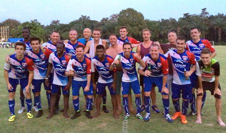 FC Planet players pose for a photo after their Bangkok Casuals 1st Division encounter with Brass Monkey FC at Horseshoe Point.