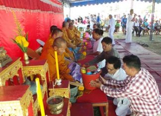 The Panrak family prayed, made merit and fed the monks lunch.