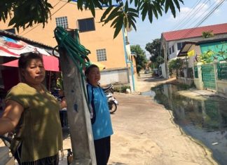 City officials have promised to send a send a truck out to pump this polluted water out of a Soi Arunothai neighborhood.