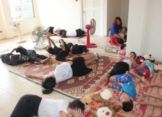 Children try out one of the unfinished new spacious bedrooms at the Baan Jing Jai Home.