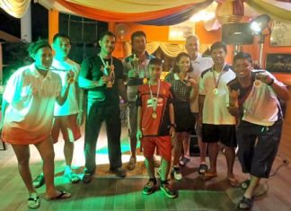 Winners and runners-up pose for a group photo at the conclusion of the 2-day Coco Club annual pairs bowls competition.