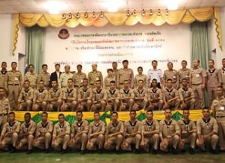 Officers, teachers and many students pose for a group photo after the launch of the program.