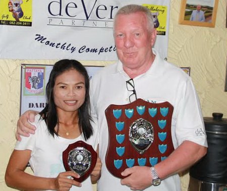 Jittina ‘Orn’ Tinpranee (left) receives the deVere overall winner’s trophy and shield from Brian Chapman.