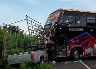 The driver and passenger were injured when their pickup was struck by a tour bus in Huay Yai.