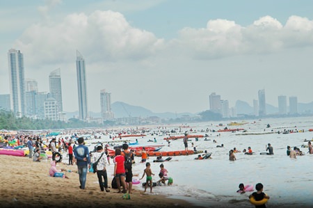 Jomtien Beach was packed on Labor Day by Thai tourists escaping the rain and heat of Bangkok, and factories in Chonburi and nearby provinces.