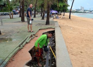 Speedboat captain Weerayuth Boonkaya points out the holes in the recently rebuilt beach promenade are particularly dangerous, especially at night.