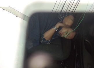 Police couldn’t wake Pornchai Wongtam so they left him inside his car whilst they towed it to the police station.