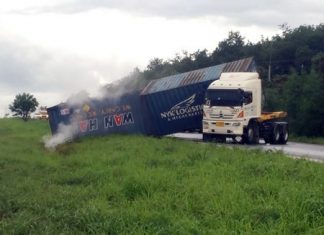 This Hino Motors truck, with a load of hydrogen peroxide, overturned on the rain-slicked highway, spilling some of the hydrogen peroxide on board which mixed with rain water creating a weak acid solution.