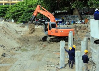 Construction staff from PSI Engineering work the drainage area near the Dusit curve in North Pattaya.