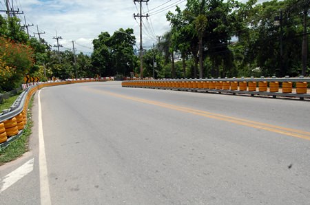 Pattaya city councilman Sanit Boonmachai said the orange bumpers installed last month along the winding road leading up to the Pratamnak viewpoint - as well as three other areas - were not installed correctly, and did not improve road safety.