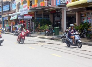 Residents need to be careful on Khao Talo Road, and avoid areas that look more like the surface of the moon than a street.