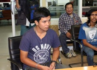 This 16-year-old vendor (left) allegedly threatened at knifepoint a Danish tourist who refused to buy one of his fake watches.