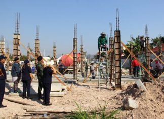 Anti-human traffic authorities inspect a construction site in Prachuap Khiri Khan province last month.