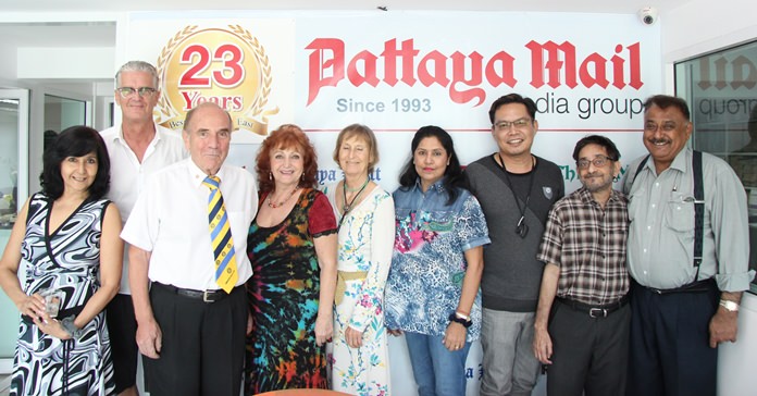 (L to R) Sue Kakarja, Jo Klemm, Dr Otmar Deter, Elfi Seitz, Dr. Margret Deter, Malee Malhotra, Victor Wong, Marlowe Malhotra and Peter Malhotra pose for a commemorative 23rd Anniversary photo.