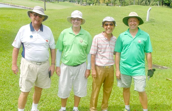 Tropical golfers pose for a photo during their round at Khao Kheow.