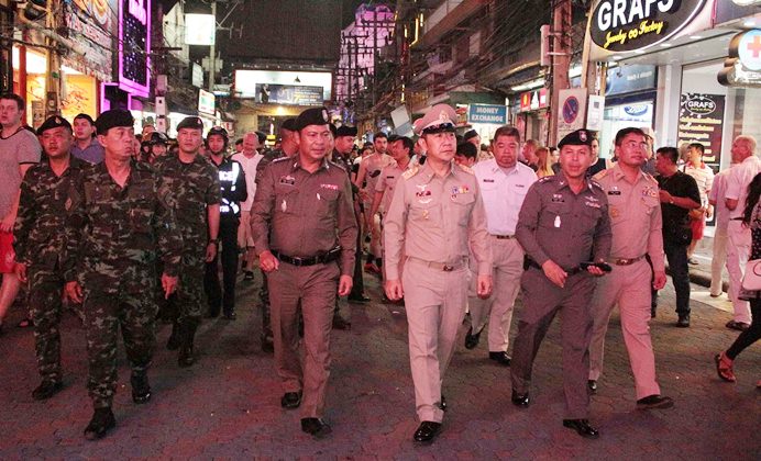 Banglamung’s new district chief Naris Miramaiwong led a contingent of district officials, Tourist and Pattaya police, and soldiers on a tour of Walking Street for a safety check through the nightlife district.