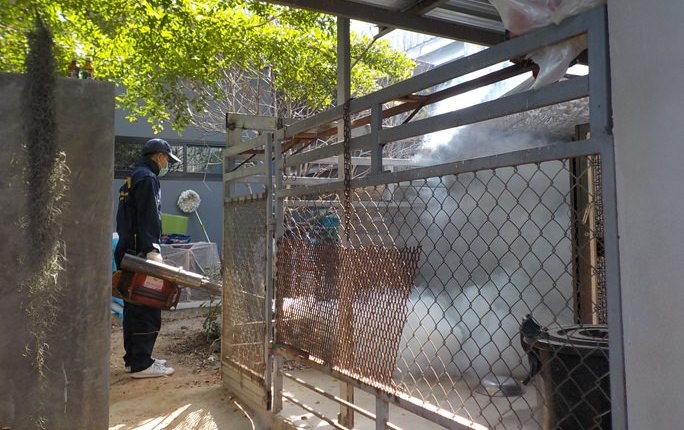 Public health workers spray Soi Khao Talo for mosquitos to prevent dengue fever and Zika.