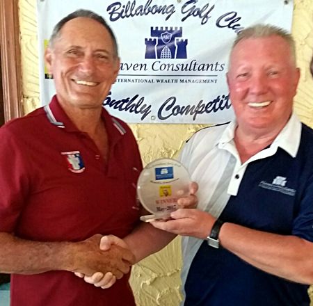 Brian Chapman (right) presents the medal to Bill Marsden.