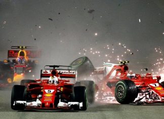 Ferrari driver Kimi Raikkonen (right) of Finland collides with teammate Sebastian Vettel of Germany at the start of the Singapore Formula One Grand Prix on the Marina Bay City Circuit Singapore, Sunday, Sept. 17. Vettel’s title rival, Lewis Hamilton of the Mercedes team, won the race to extend his championship lead.