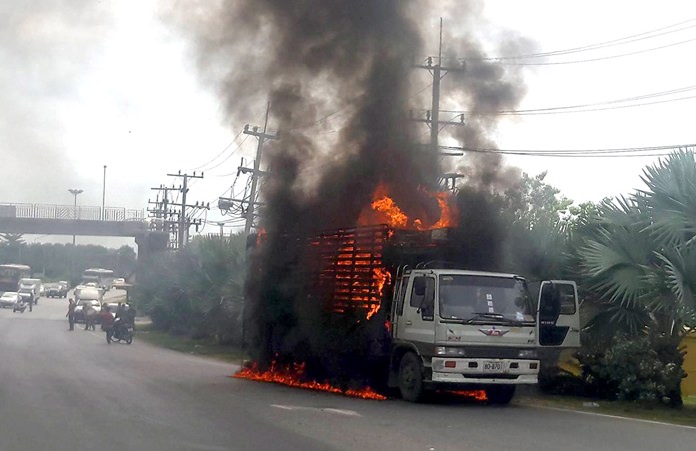 A million baht in furniture went up in flames and traffic on Sukhumvit Road in front of Najomtien Temple was backed up for over an hour when this six-wheeled moving truck caught fire in Sattahip.