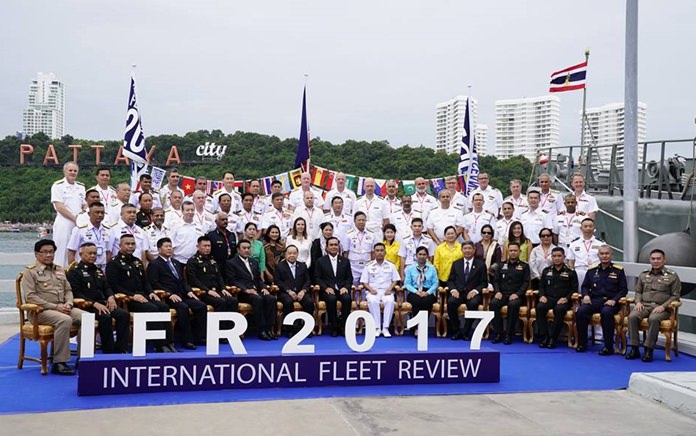 Prime Minister Prayut Chan-o-cha, Defense Minister Prawit Wongsuwon, and RTN commander-in-chief Adm. Naris Pratumsuwan gather top officers of the 26 warships from 19 countries for a commemorative group photo at Bali Hai Pier.