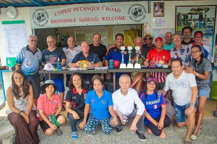 Friends of Avenin Daniel pose for a group photo during the charity pentanque tournament held in his memory.