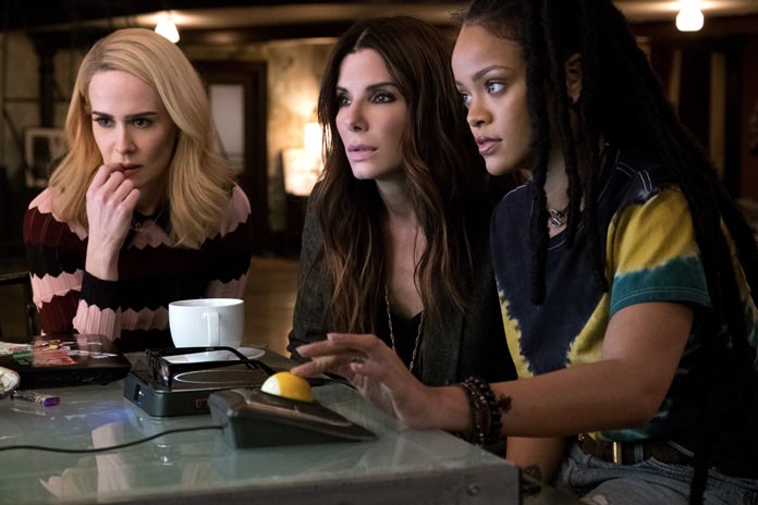 This image released by Warner Bros. shows Sarah Paulson (from left) Sandra Bullock and Rihanna in a scene from “Ocean’s 8.” (Barry Wetcher/Warner Bros. via AP)