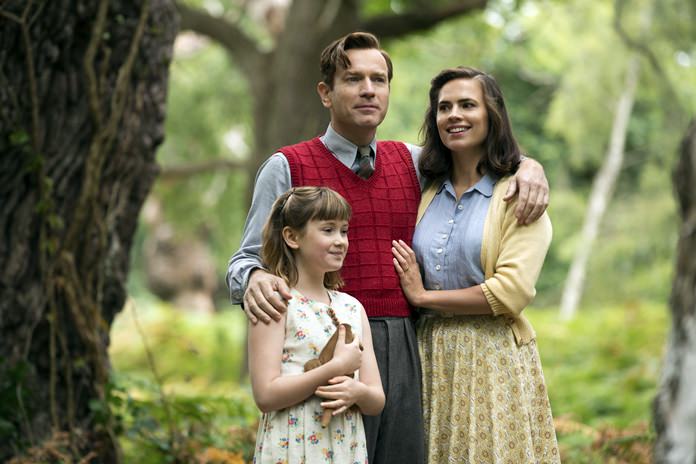 This image shows (from left) Bronte Carmichael, Ewan McGregor and Hayley Atwell in a scene from “Christopher Robin.” (Laurie Sparham/Disney via AP)