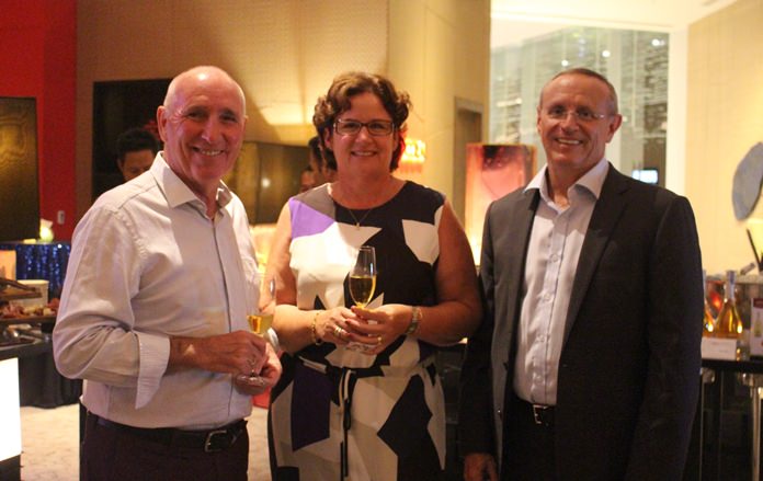 Helen Trabut is flanked by Michael Scollins (left) and the ever so friendly GM Jean-Pierre Trabut (right).