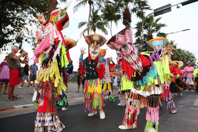 Phi Ta Khon (ghost) dancers provided a lively atmosphere during the parade.