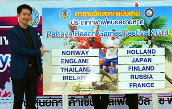 Pattaya Deputy Mayor Poramet Ngampichet stands on stage at the Royal Garden Plaza after overseeing a press conference and team draw for the 2019 Pattaya Beach Games Festival.