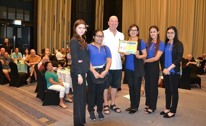 Waraporn with colleagues, and her PCEC certificate.