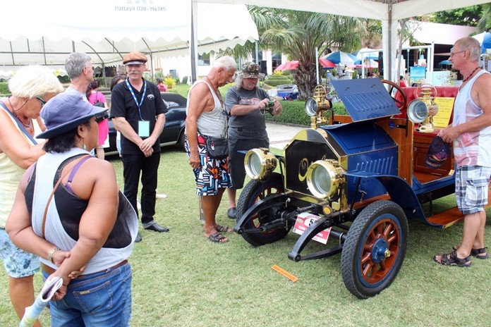 Vintage cars always attract a hoard of admirers.