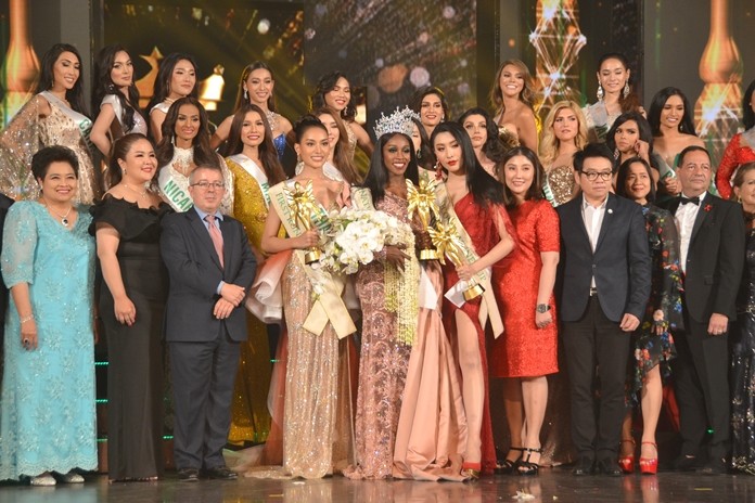 Winners and contestants pose on stage after the show with judges and sponsors of the Miss International Queen 2019 beauty contest at Tiffany Theater, Pattaya.