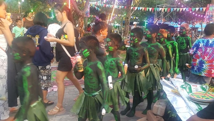 Spirits eat sacrificial offerings provided by local residences at Lan Pho Public Park Naklua.