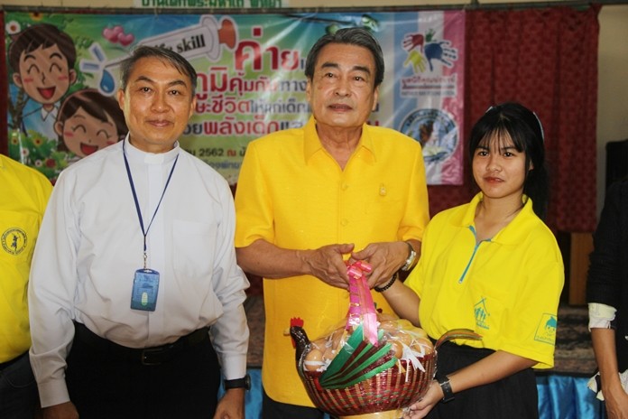 Deputy Mayor Ronakit Ekasingh opened the camp and in return received a basket of eggs from Father Peter.