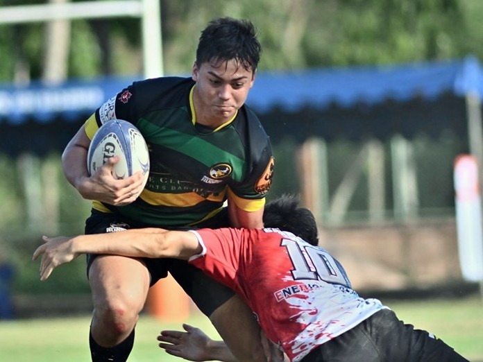 A French Asian Barbarian put a hard tackle on Southerners Black in the Cup final. (Photo/Robert Lincoln)