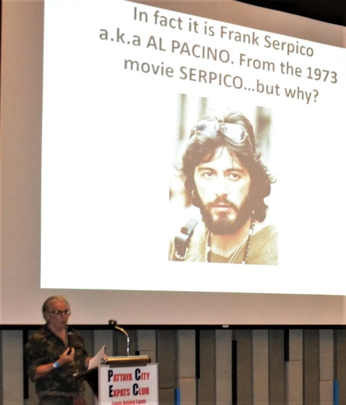 Following the slide depicting a bearded man's face on a Thai truck's mud flap, Dr. Stewart McFarlane introduced another slide identifying the face as that of Al Pacino from the 70's movie Serpico. He then went on to enlighten his audience on why Thai truckers would include the likeness of Serpico on their trucks.