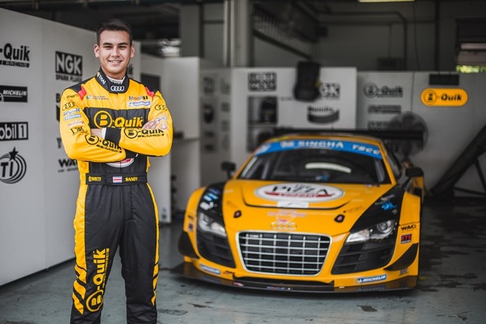 Thai racing driver Sandy Stuvik poses with the B-Quik Racing Audi R8 GT3 Ultra.