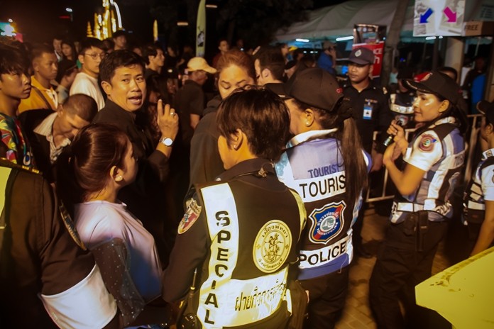 City hall municipal police chief, Pol. Maj. Jeerawat Sukontasap organizes officers on security duty at the entrance.