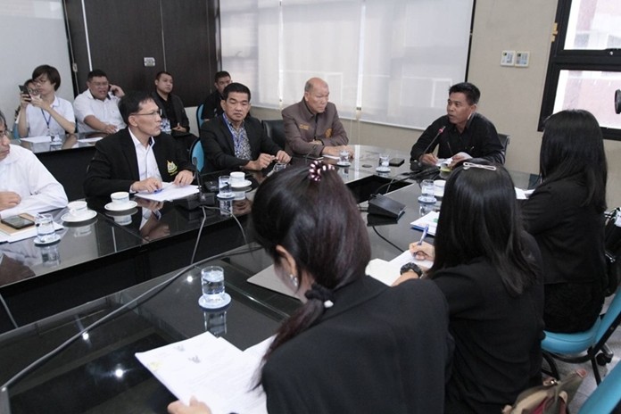 Chonburi Deputy Gov. Wisit Pungpetch chairs a meeting on a Ministry of Natural Resources and Environment draft announcement that would designate Koh Larn, Koh Sak and Koh Krok as protected environmental areas.