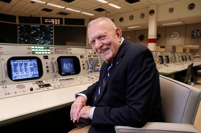 Gene Kranz, aerospace engineer, fighter pilot, an Apollo-era flight director and later director of NASA flight operations, sits at the console where he worked during the Gemini and Apollo missions at the NASA Johnson Space Center in Houston. (AP Photo/Michael Wyke)