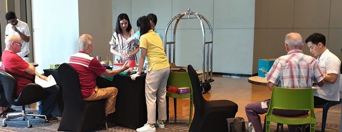 Medical researchers from Mahidol University obtain information and blood samples from PCEC attendees who volunteered to participate in their research study about the prevalence of Dengue Fever, Japanese Encephalitis, and Zika diseases in long term expats in Thailand.