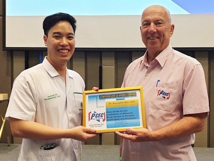 MC Roy Albiston presents Dr. Amornphat Kitro with the PCEC’s Certificate of Appreciation for his timely and informative talk about the mosquito borne diseases of Dengue Fever and Japanese Encephalitis.