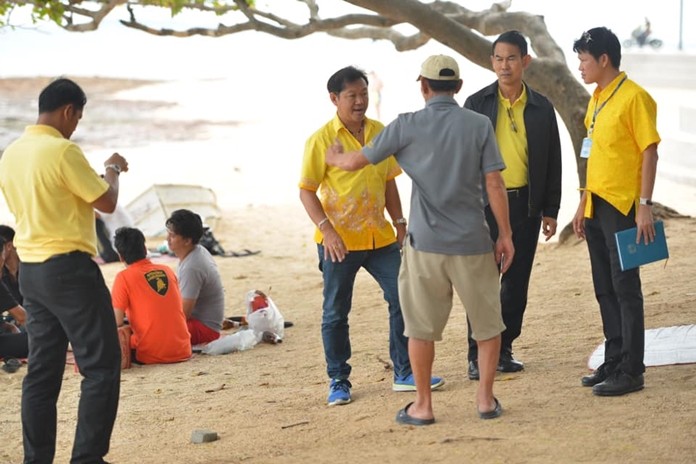 Deputy Mayor Pattana Boonsawad leads a delegation of city maintenance and environmental officials to Yom Beach to determine how much work is needed for a long-overdue cleanup.