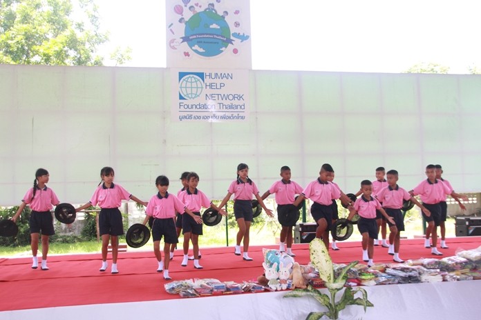 Human Help Network Thailand Director Radchada Chomjinda, her staff and 100 children thanked the guests and the kids put on a stage show.