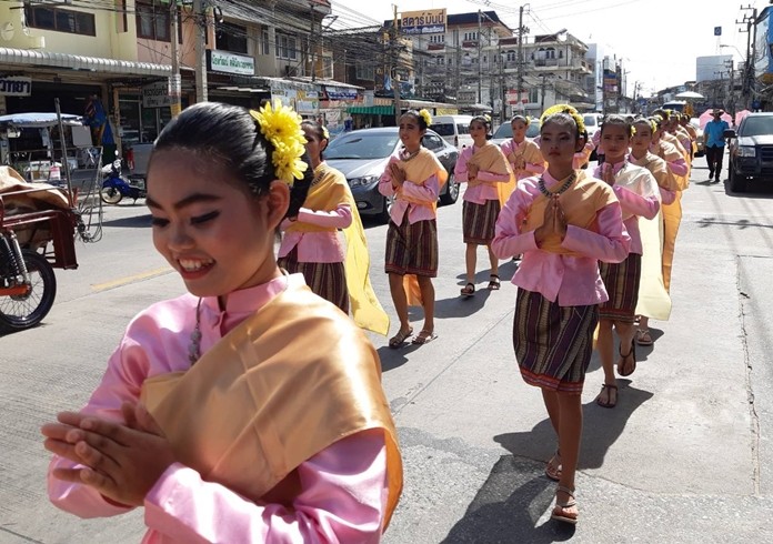 Students from Pattaya School No. 9 dress in their best traditional clothing as they march in the parade.